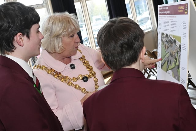 The Mayor of Wigan Coun Marie Morgan, centre, chats with pupils about their new school and takes a look at the plans.