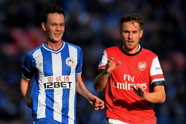 Josh McEachran in action for Latics against Arsenal in the 2014 FA Cup semi-final