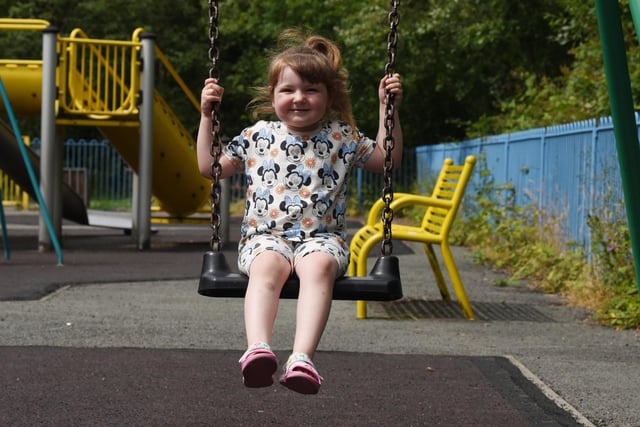 Skye McSorley, three, has fun in the sun at Three Sisters Recreation park, Ashton-in-Makerfield.