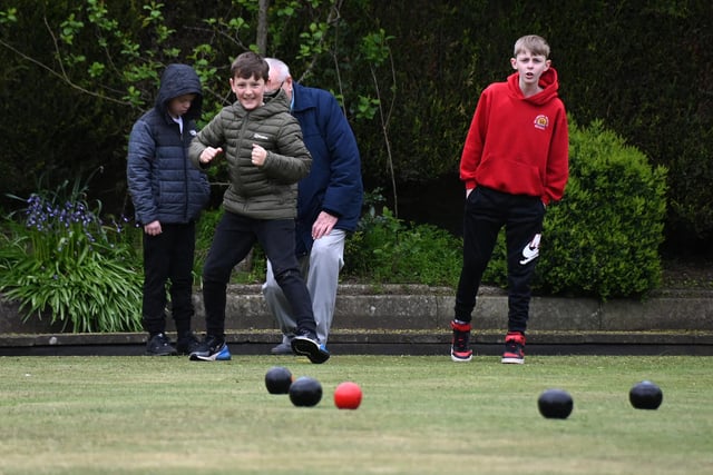 Pupils from Millbrook Primary School, Shevington try bowls at Shevington Village Bowling Club.
