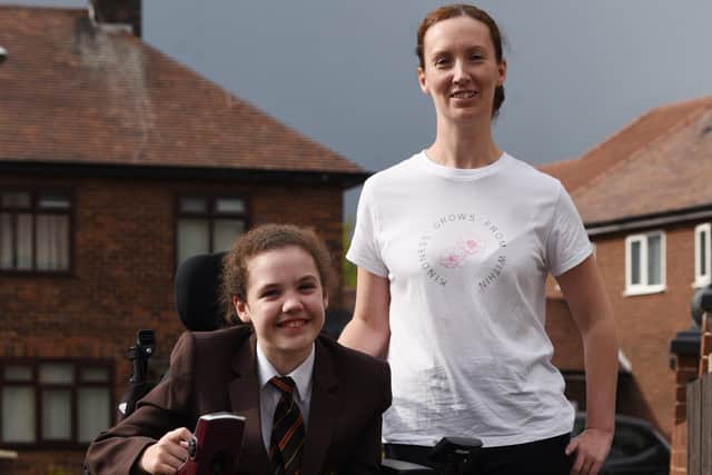 Amy Fairhurst, 12, from Orrell, has cerebral palsy and needs to raise £23,000 for an operation to help stop painful spasms, pictured with mum Cheryl Watkin.