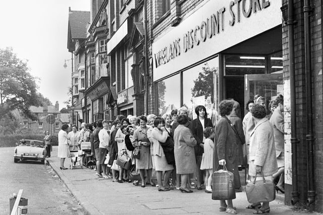 The queue for a job at Dave Whelan's Discount Store on Hope Street, Wigan, in 1967.