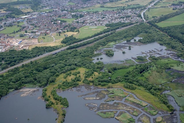 Ince Moss next to Bamfurlong Junction on the West Coast Main Line, Platt Bridge, and Bamfurlong top right, over the Leeds and Liverpool Canal.