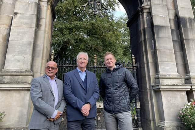 Left to right: Keith Bergman (general manager, Haigh Woodland Park), Coun David Molyneux MBE (Leader, Wigan Council) and Stuart Holden (Be Well Wigan service manager) outside the Plantation Gates