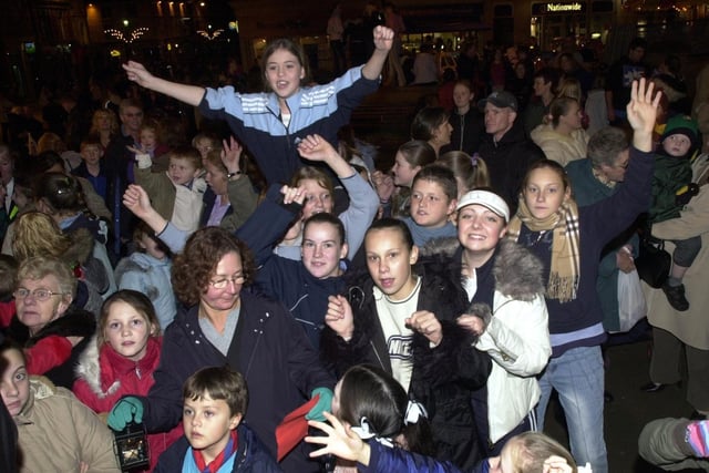2003 - Wigan Christmas Lights: Enjoying the music in Market Place