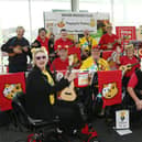 Wigan Ukulele Club members are playing for Pudsey