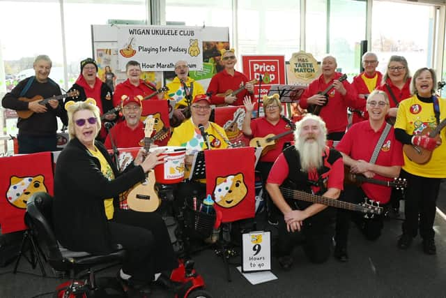 Wigan Ukulele Club members are playing for Pudsey