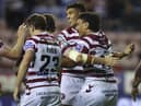 Patrick Mago celebrates his first try for Wigan