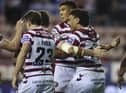 Patrick Mago celebrates his first try for Wigan