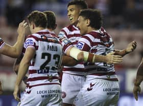 Patrick Mago celebrates his first try for Wigan