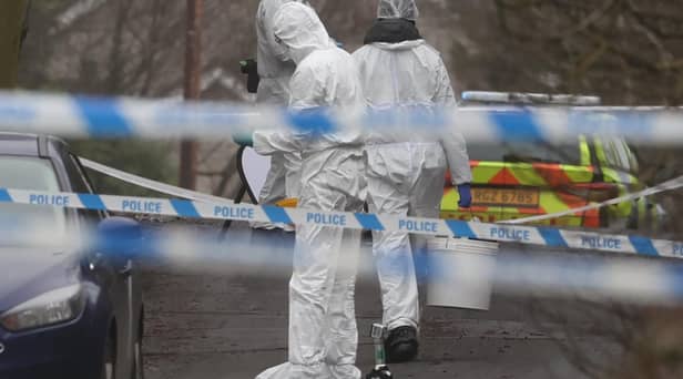 Forensic officers from Police Service of Northern Ireland (PSNI) at the sports complex in the Killyclogher Road area of Omagh