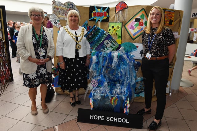 Event organisers Gillian Leigh, headteacher at Marsh Green Primary School, left, and Cathy Whalley, headteacher at Winstanley Community Primary School, with the Mayor of Wigan Coun Marie Morgan next to one of the many art displays.