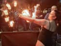 Fire eater performing outside Sky Lounge in Leigh on April 2