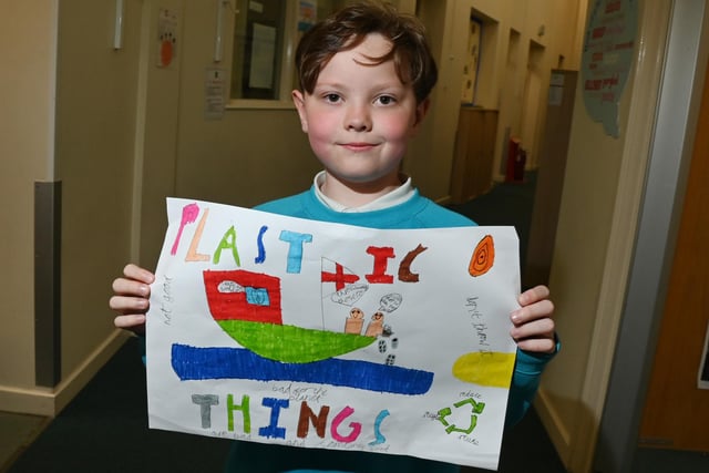 Pupils designed posters about plastic.