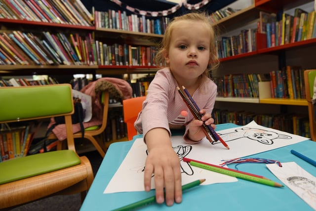 Charlotte, two, joining in with celebrations at Standish Library, as they host a garden party to celebrate the Queen's platinum jubilee.