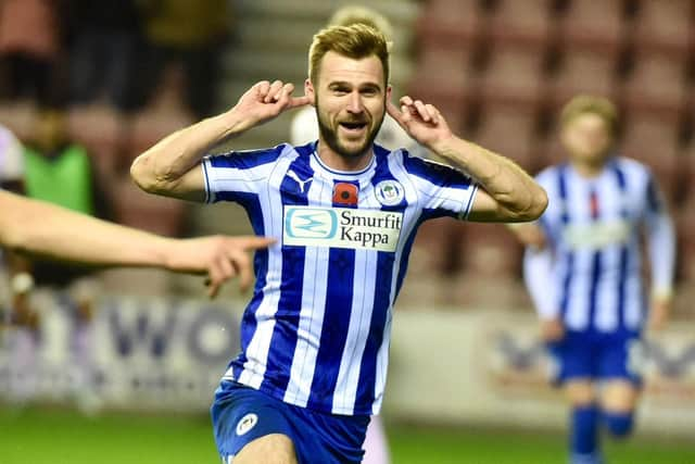 Callum McManaman celebrates his late winner against Peterborough