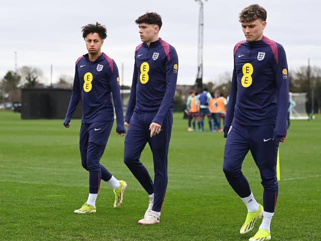 Luke Chambers (centre) has been away on international duty this week with England Under-20s