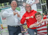 Grand Arcade's centre manager Mike Matthews and marketing executive Gill Sarath do the Joining Jack salute with Jack Johnson, right