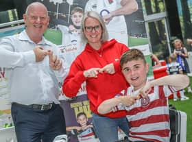 Grand Arcade's centre manager Mike Matthews and marketing executive Gill Sarath do the Joining Jack salute with Jack Johnson, right