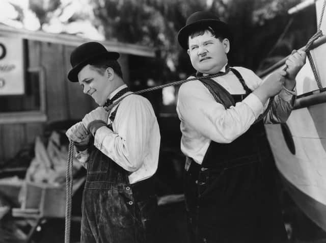 Laurel and Hardy in their short film Towed in a Hole