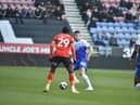 The decision to substitute young Charlie Hughes was followed by loud booing inside the DW