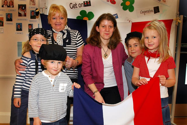 French ambassadress Helene Joulain with Aillen Howard and pupils at Woodfield Primary School, where she gave a talk about the twinning with Angers