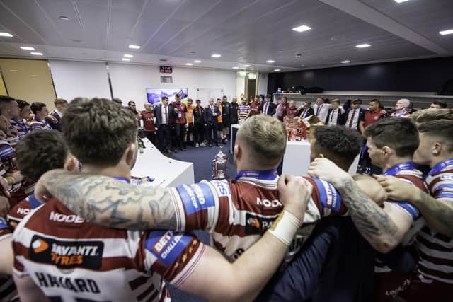 Wigan Warriors celebrate in the changing rooms after the Challenge Cup win