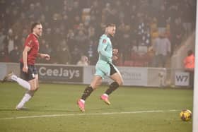 This goal from Stephen Humphrys earned Latics an FA Cup third-round tie against Manchester United