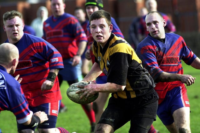Andy Higham looks to attack for North West Counties League Division Five champions Wigan Keepers Bulldogs against Bolton Mets on Saturday 20th of March 2004. Keepers rounded off their league programme with a 12-4 victory.