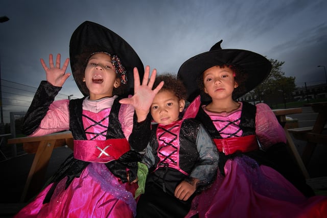 Sisters Destiny, six, Desire, 18 months, and Danika, four, at a Halloween spooky supper on Woodcock Drive, Platt Bridge, run by the Voice of Woodcock Community Group and Wigan Youth Service