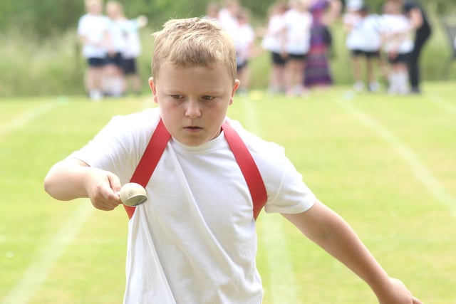 An egg and spoon race during sports day in July 2013