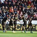 Will Keane accepts the congratulations of his team-mates after opening the scoring