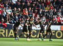 Will Keane accepts the congratulations of his team-mates after opening the scoring