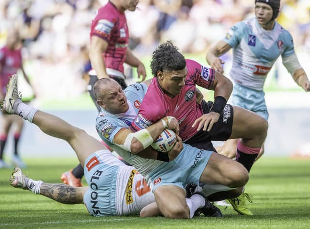 Wigan Warriors face St Helens at the DW Stadium