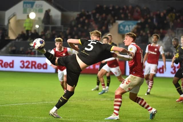 Jack Whatmough gets stuck in during a scrappy game against Bristol City