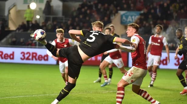 Jack Whatmough gets stuck in during a scrappy game against Bristol City