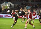 Jack Whatmough gets stuck in during a scrappy game against Bristol City