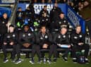 Kolo Toure with his new backroom staff on their first outing at the DW Stadium