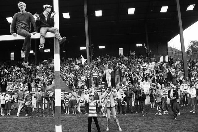 Wigan fans take every vantage point as they greet the team at Central Park on their homecoming from Wembley on Sunday 6th of May 1984.