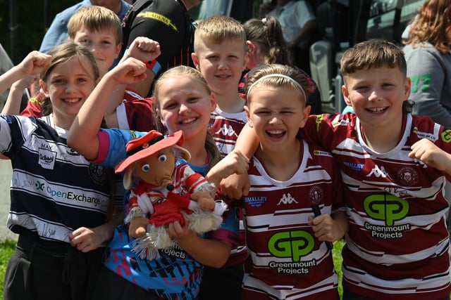 An army of fans dressed in cherry and white gathered at Robin Park Arena to cheer on Wigan Warriors, as they began their journey to Wembley, to take on Warrington Wolves in the Challenge Cup Final at Wembley.
