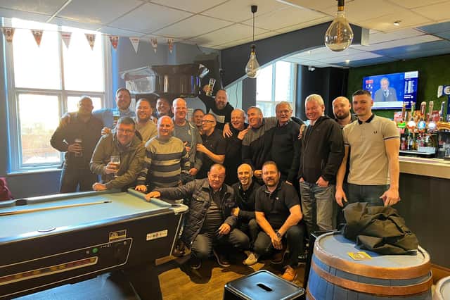 Inside Andertons new sports bar with football fans and customers.