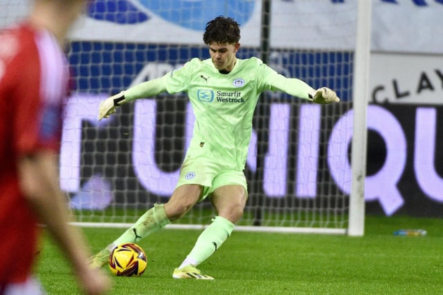 Superb early save in the early stages was his only real involvement, but made himself a hero with three brilliant penalty stops