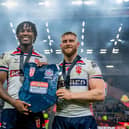 Wigan Warriors duo Junior Nsemba (left) and Luke Thompson (right) celebrate England's Test series win over Samoa in 2024