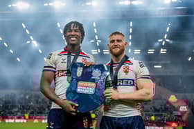 Wigan Warriors duo Junior Nsemba (left) and Luke Thompson (right) celebrate England's Test series win over Samoa in 2024