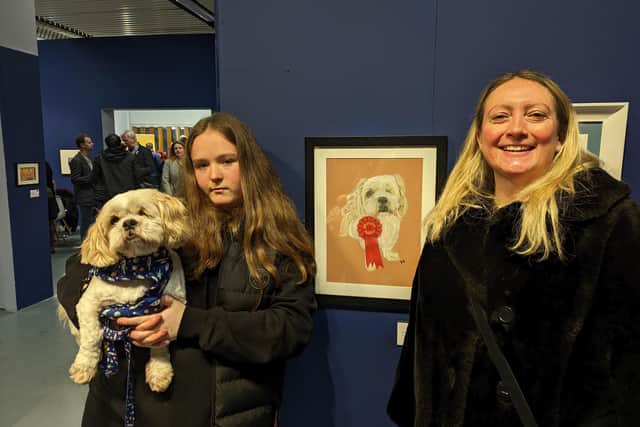 Ollie, Abi and Lisa with the artwork