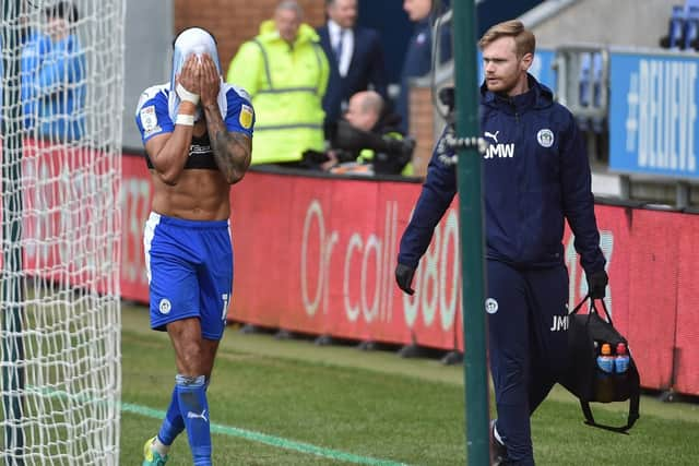 Curtis Tilt limps off against Bolton