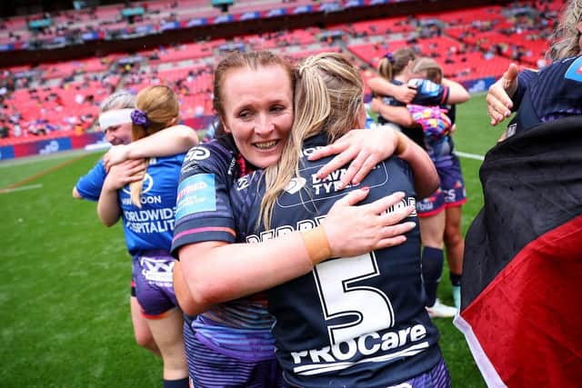Holly Speakman celebrates Wigan Warriors Women's Challenge Cup final triumph at Wembley with teammate Ellise Derbyshire
