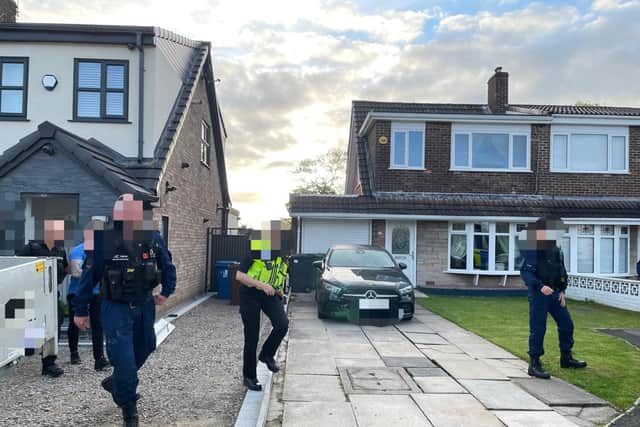 Wigan dawn raids as part of organised crime crackdown.