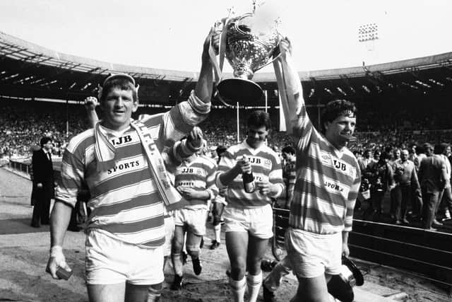Brian Dunn parades the Challenge Cup trophy with Graeme West following the 1985 win