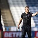Former Wigan Warriors youngster Luke Robinson has been appointed interim coach at Huddersfield Giants